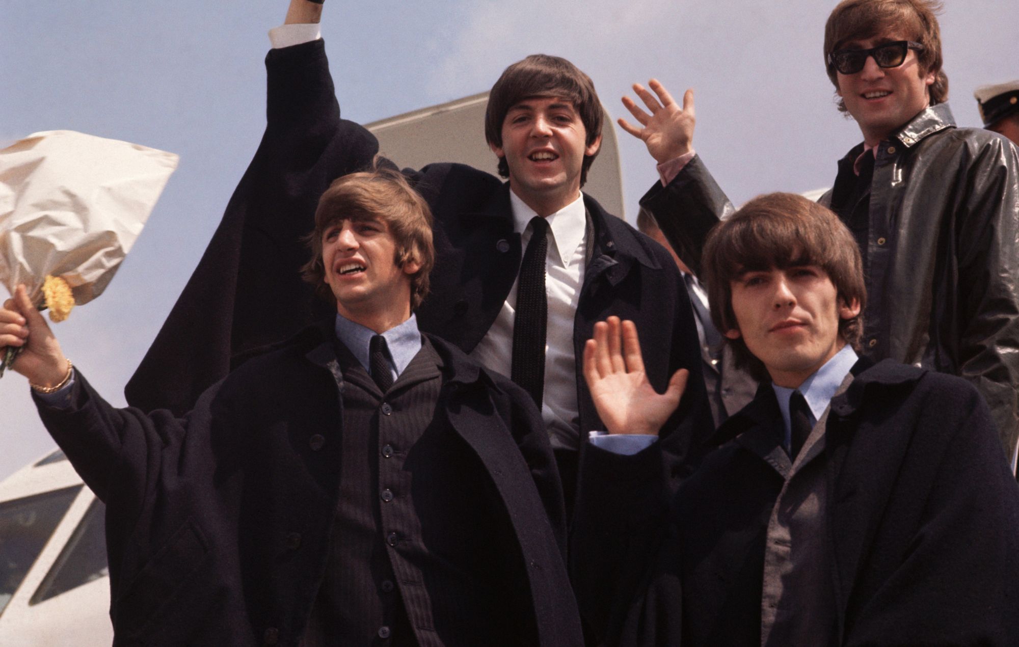Les Beatles à leur arrivée à Londres après une tournée en Australie en 1962