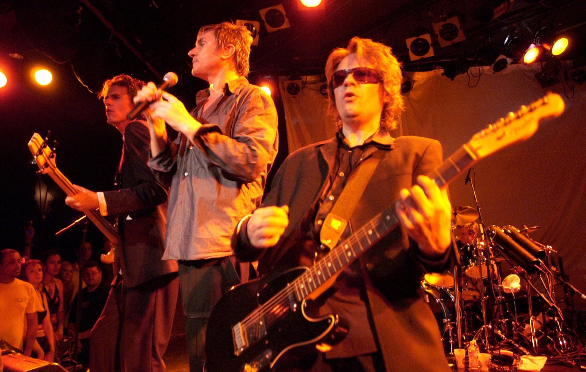 John Taylor, Simon Le Bon et Andy Taylor sur scène avec Duran Duran