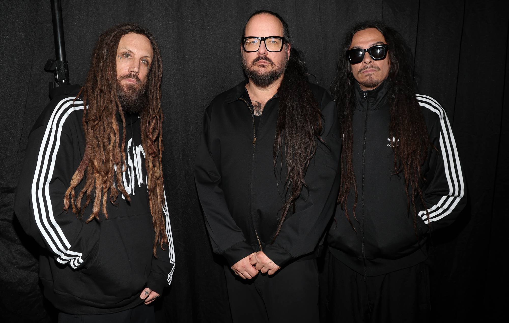 Brian Welch, Jonathan Davis et James Shaffer de KoRn