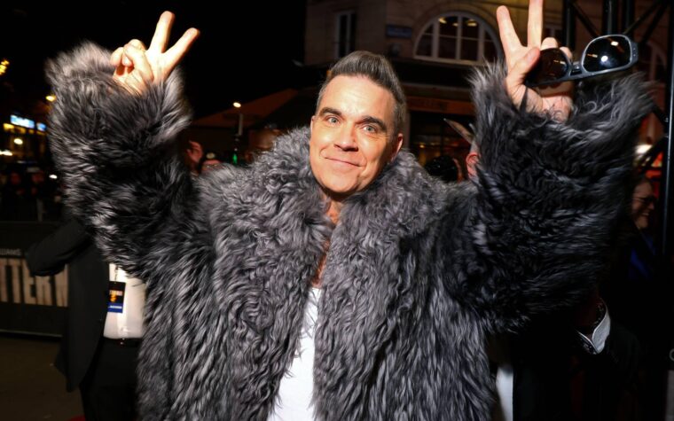 Robbie Williams dit "vous n'avez jamais rencontré quelqu'un qui veut être gay autant que moi"