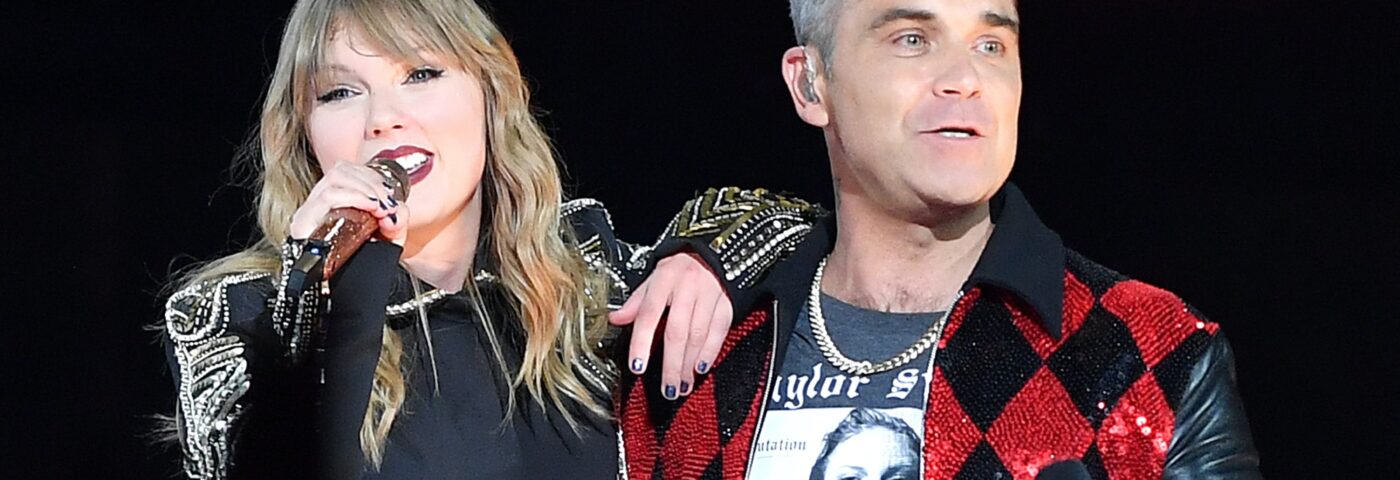 Robbie Williams ne pense pas que Taylor Swift « savait quoi que ce soit de lui » lorsqu'elle l'a invité sur scène