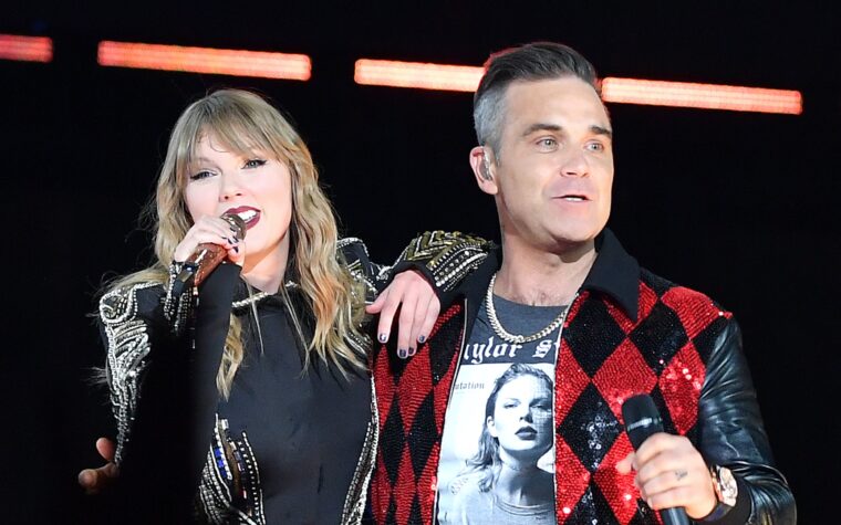 Robbie Williams ne pense pas que Taylor Swift "savait quoi que ce soit de lui" lorsqu'elle l'a invité sur scène